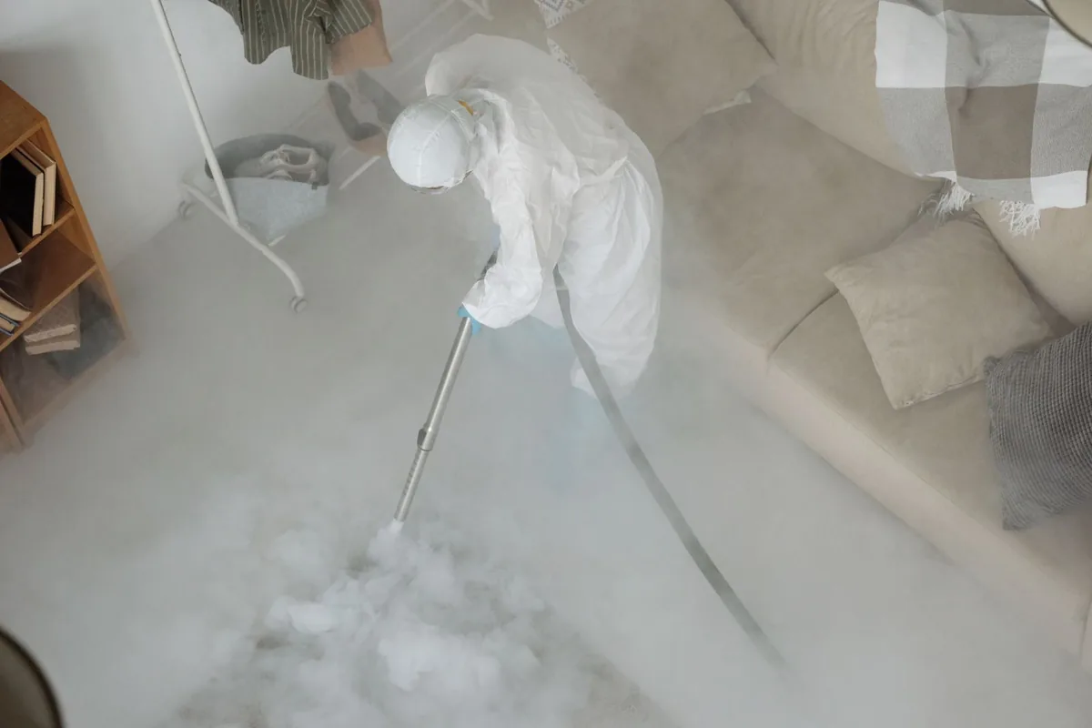 Biohazard cleanup technician in protective equipment, Trainer, PA